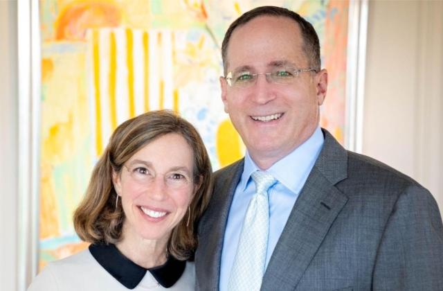 Jeannie and Jonathan Lavine pictured together, with one arm around the other